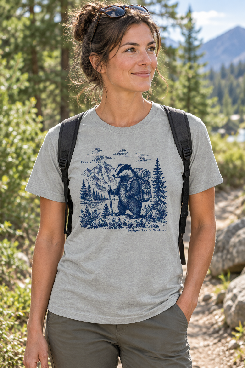 Take a Hike tee on a wooded trail
